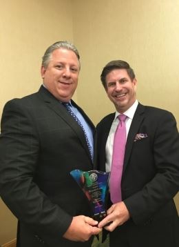 Richard Chait accepting award